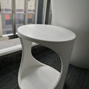 Shaped artificial stone stool