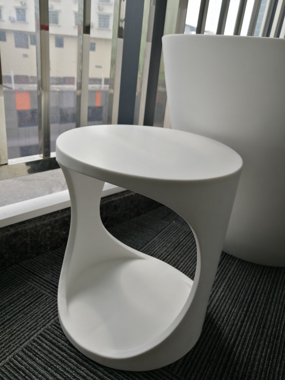 Shaped artificial stone stool